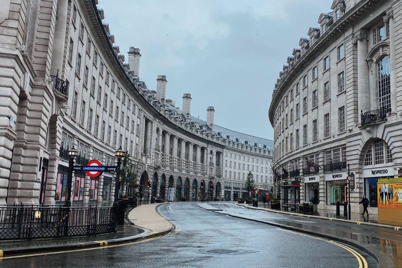 The curve of Regent Street in central London on a wet, quiet morning